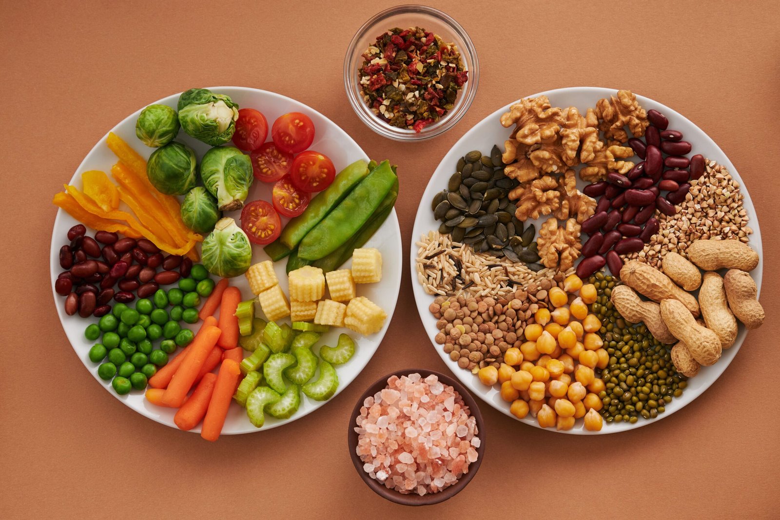 Assorted magnesium-rich foods including nuts, seeds, and vegetables on plates