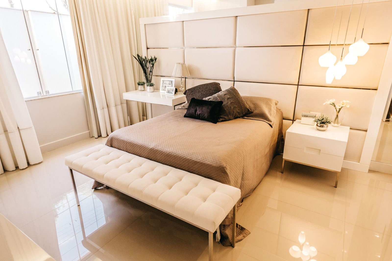Cozy, softly lit modern bedroom, an environment suited to reducing screen time before bed